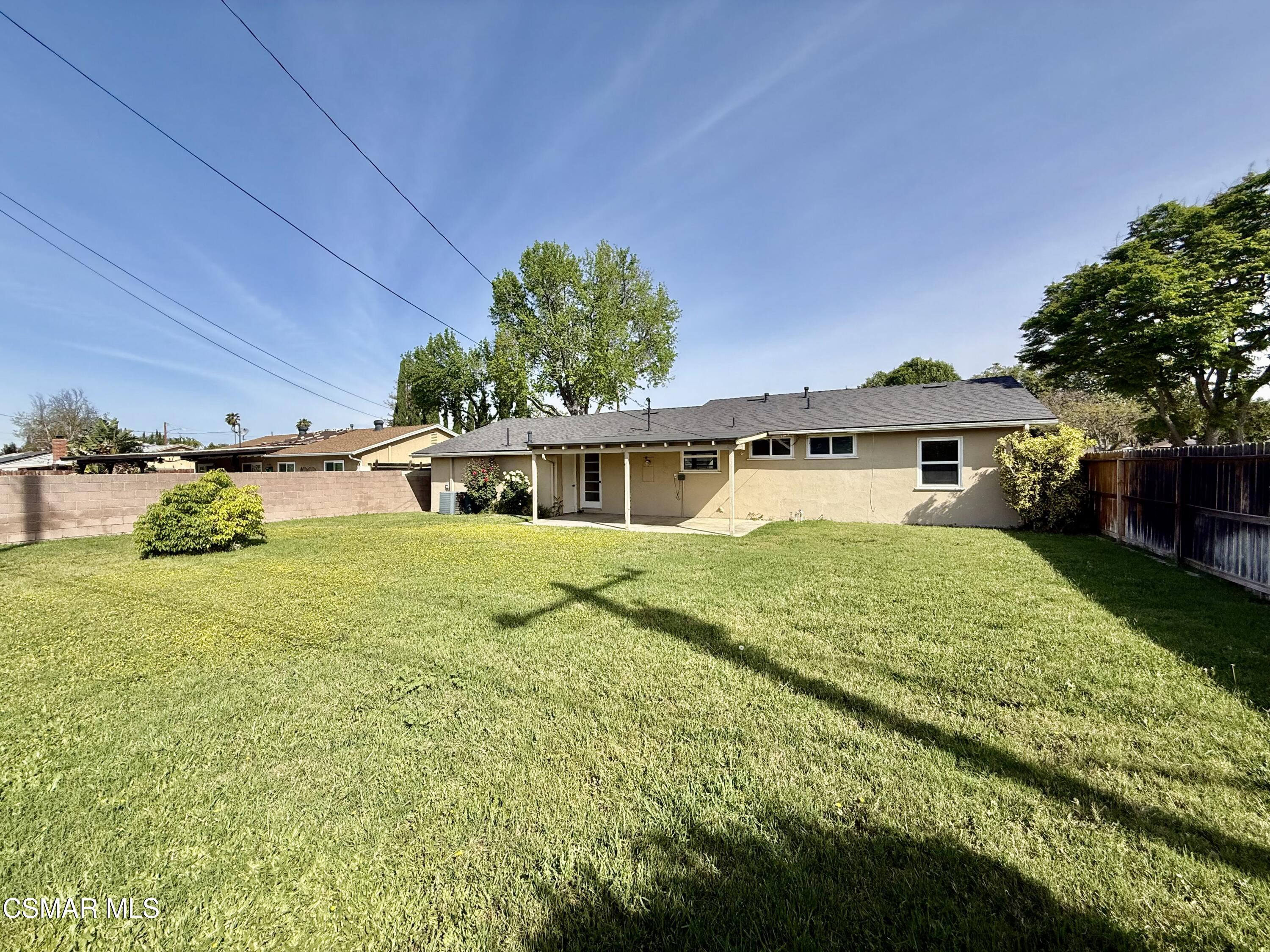 4090 Florence Street Simi Valley, CA 93063 - Photo 15 of 16 a front view of a house with a yard