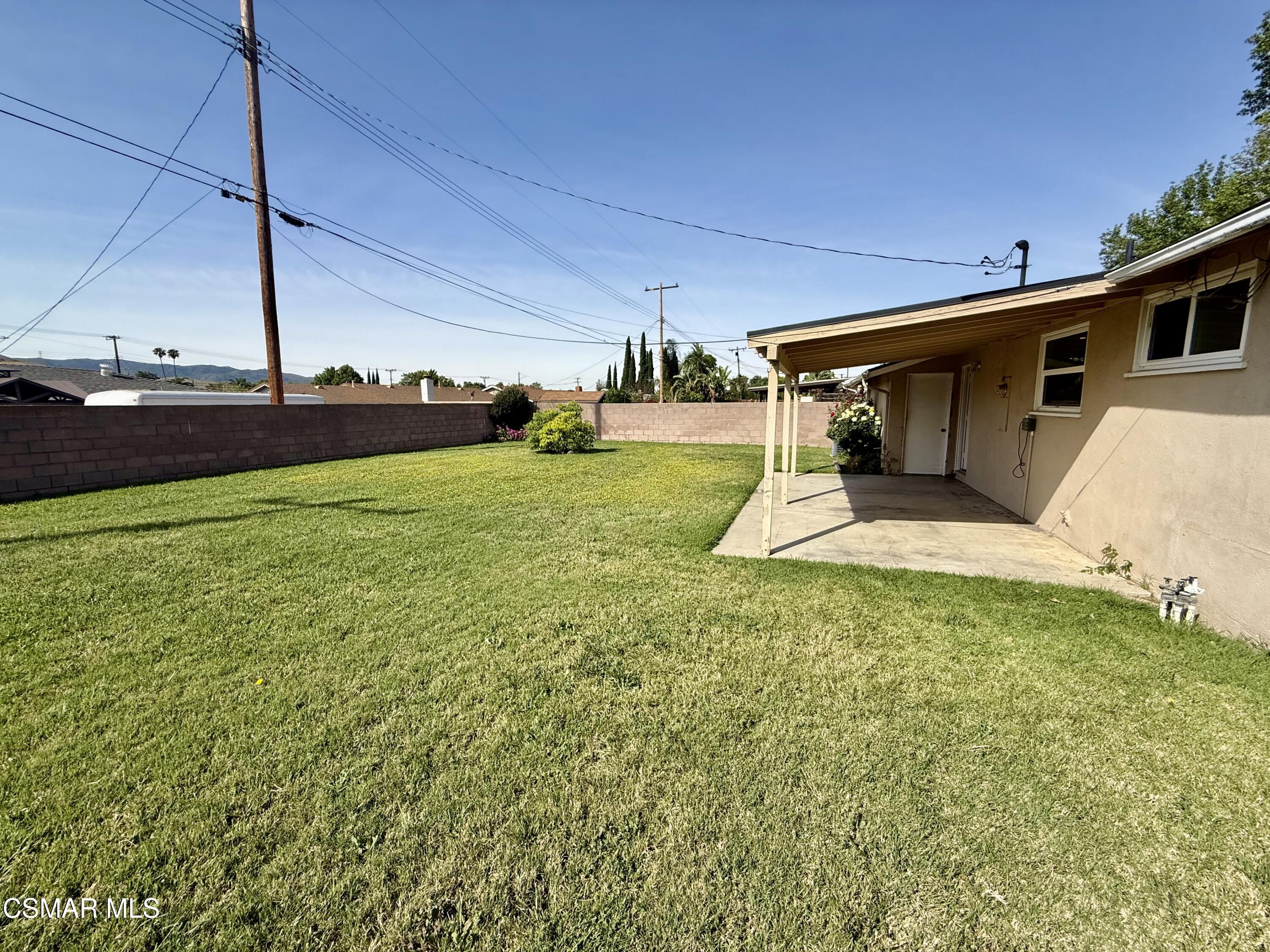 4090 Florence Street Simi Valley, CA 93063 - Photo 16 of 16 a house view with a backyard space