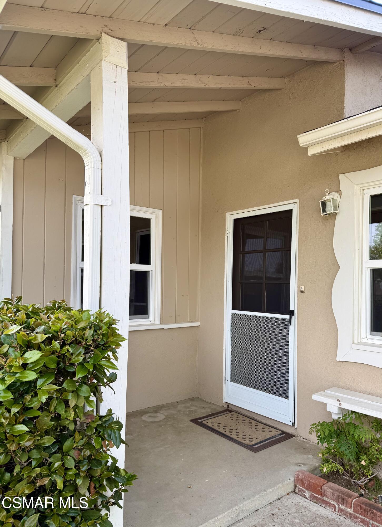 4090 Florence Street Simi Valley, CA 93063 - Photo 3 of 16 a front view of a house with garden