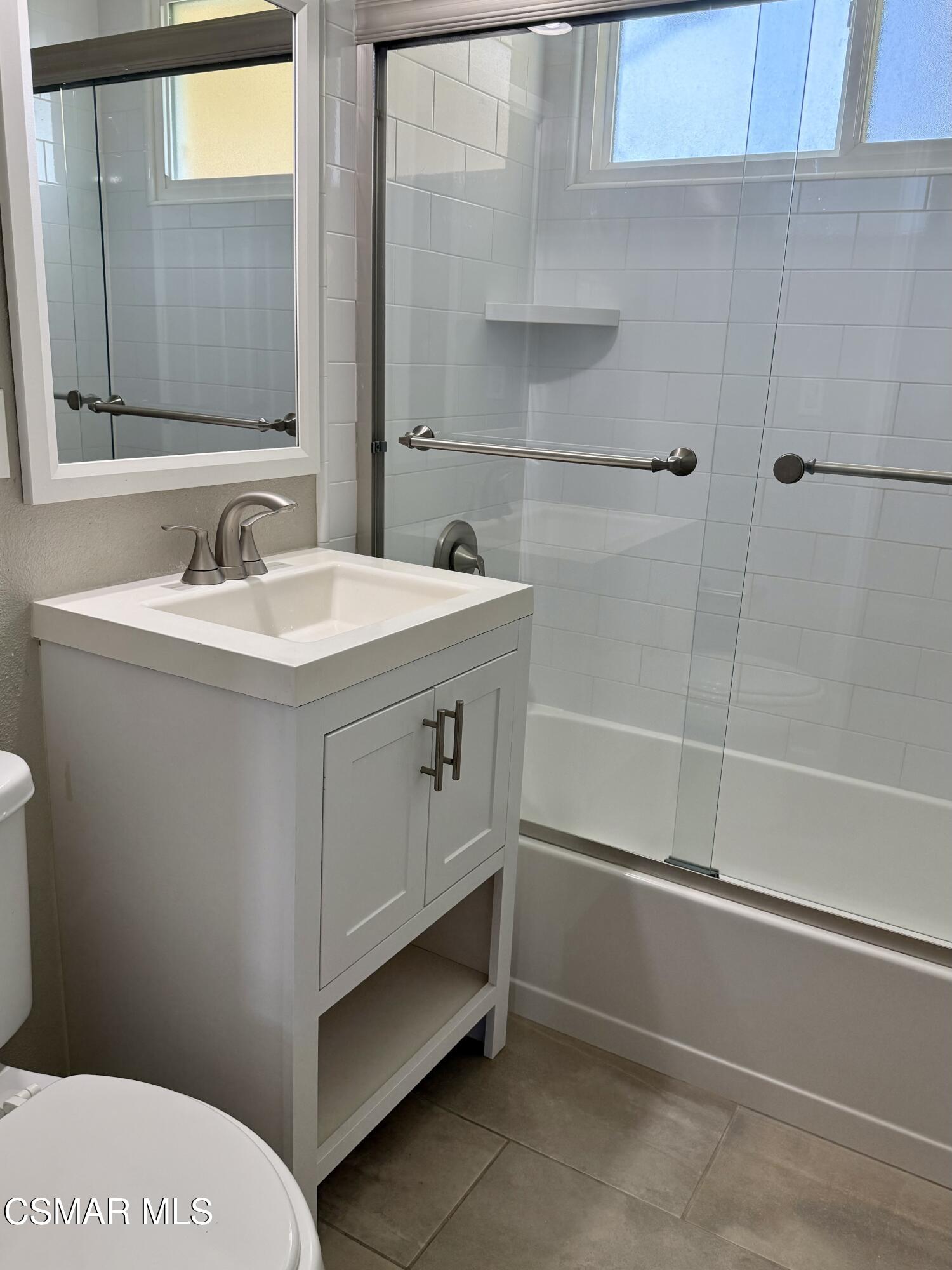 4090 Florence Street Simi Valley, CA 93063 - Photo 10 of 16 a bathroom with a sink a toilet and shower