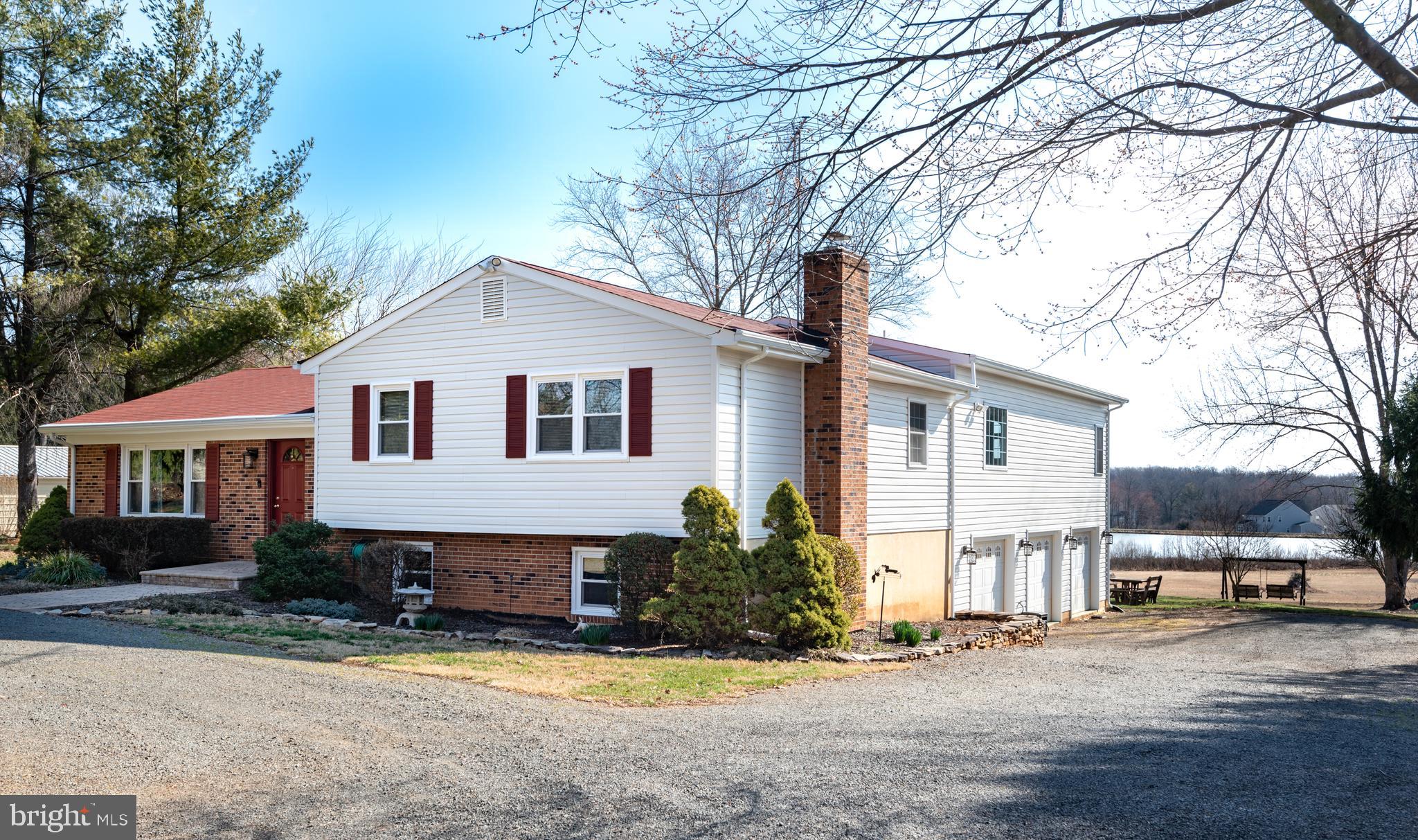 6787 Riley Road Warrenton, VA 20187 - Photo 3 of 45 Side view of the major addition and 3.5 car garage