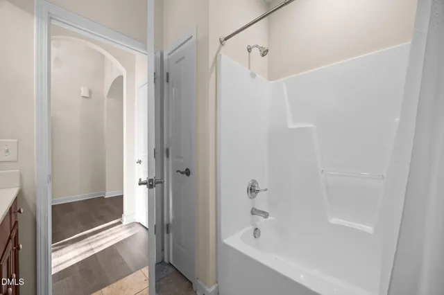 a bathroom with a bathtub