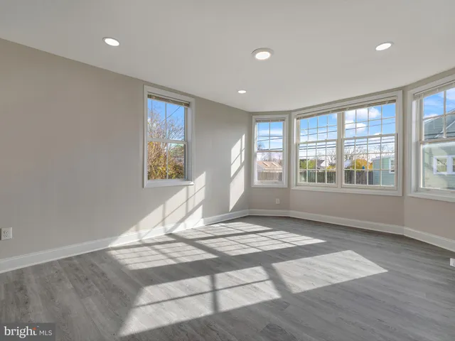 a view of kitchen with wooden floor