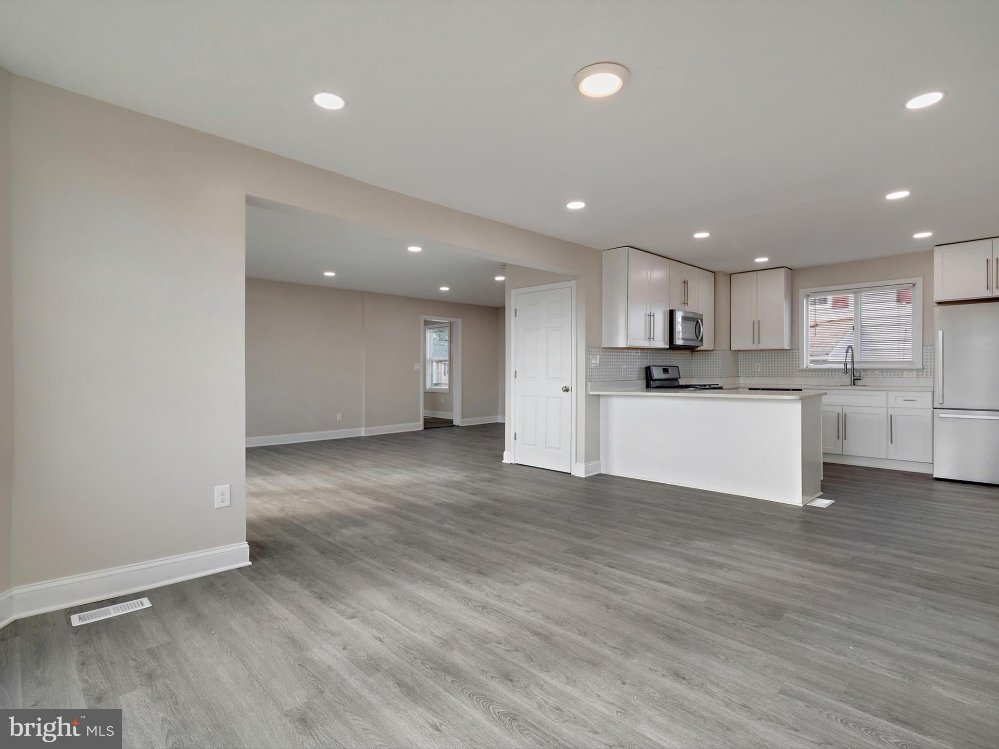 4129 5th Street Baltimore, MD 21225 - Photo 12 of 52 a view of kitchen with wooden floor