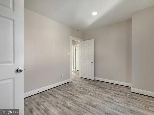 a bathroom with a shower and toilet