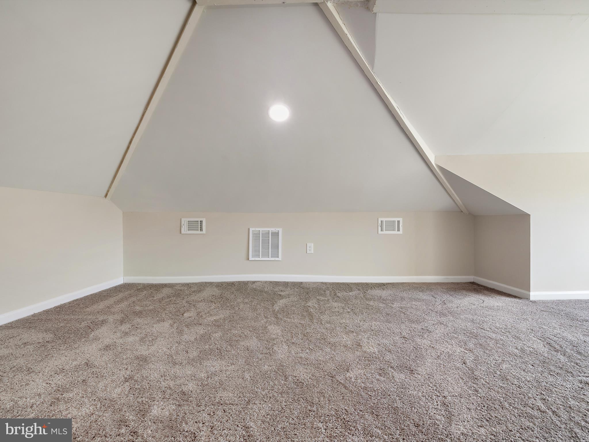4129 5th Street Baltimore, MD 21225 - Photo 34 of 52 a view of an empty room with stairs