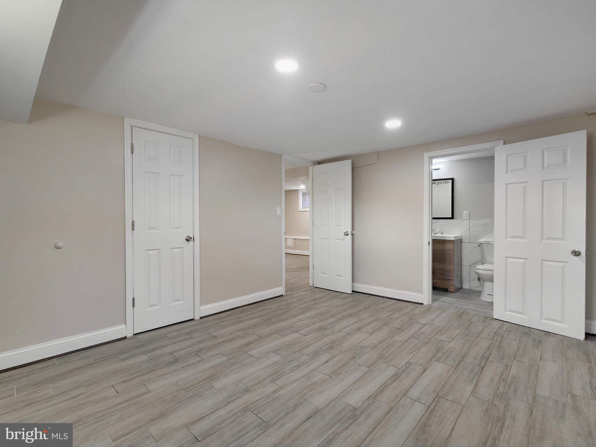 4129 5th Street Baltimore, MD 21225 - Photo 40 of 52 a view of empty room with wooden floor