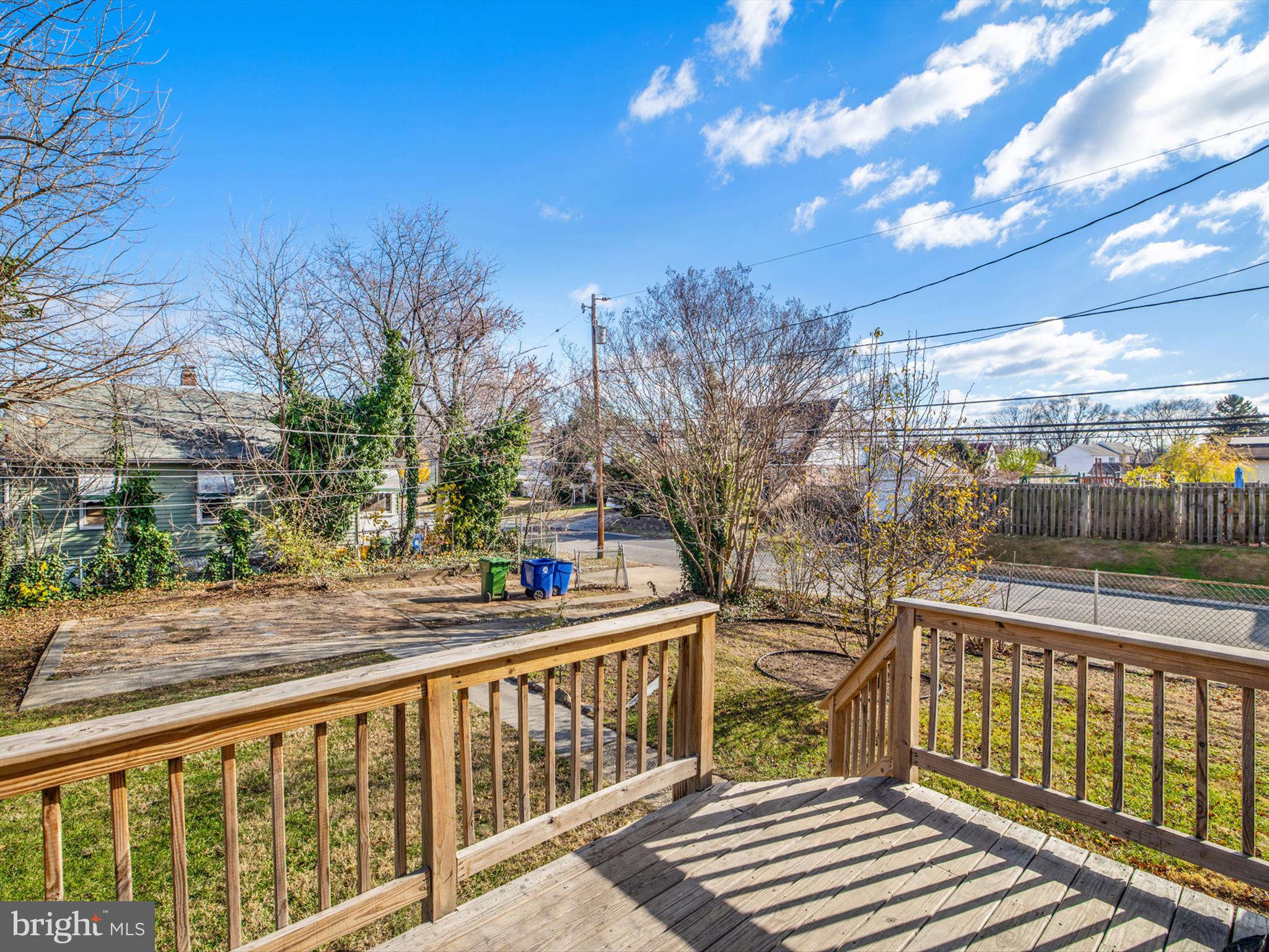 4129 5th Street Baltimore, MD 21225 - Photo 43 of 52 a view of a balcony with wooden fence