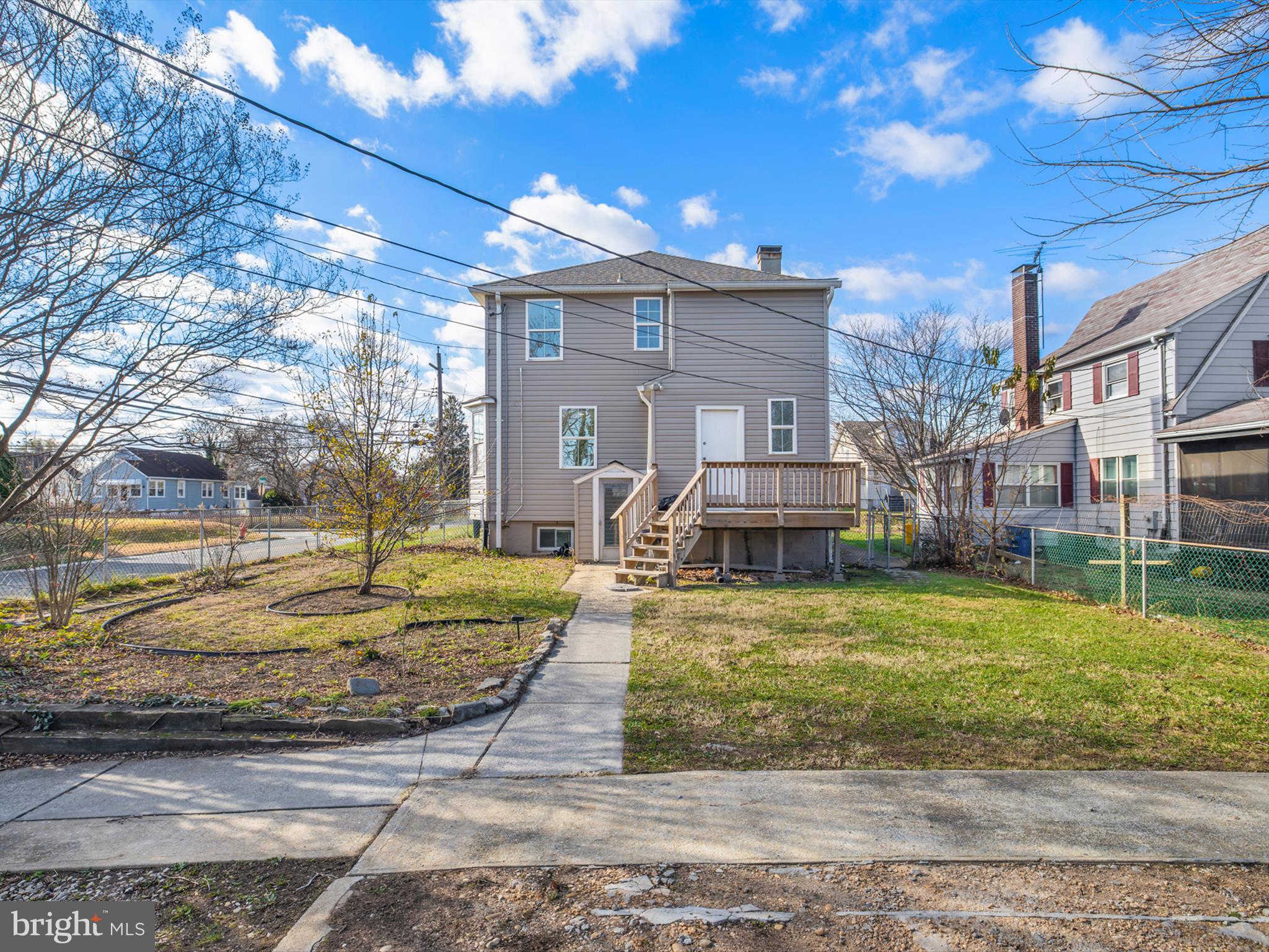4129 5th Street Baltimore, MD 21225 - Photo 47 of 52 a front view of a house with garden