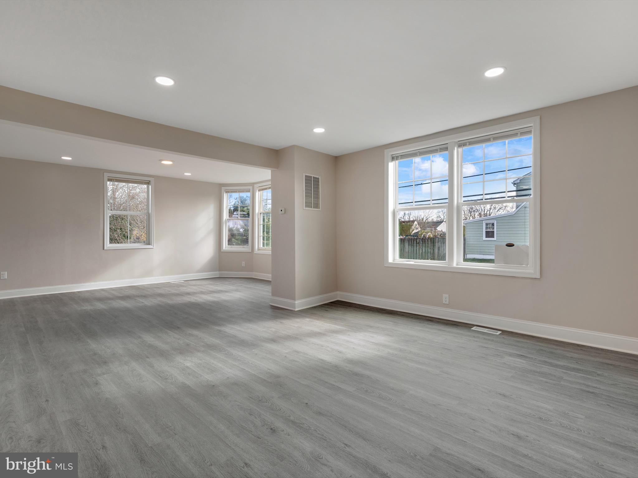 4129 5th Street Baltimore, MD 21225 - Photo 7 of 52 a view of an empty room with a window