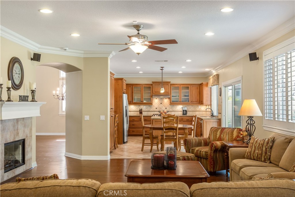 33351 Nicholas Common Temecula, CA 92592 - Photo 17 of 42 a very nice looking living room with a large window and a fireplace