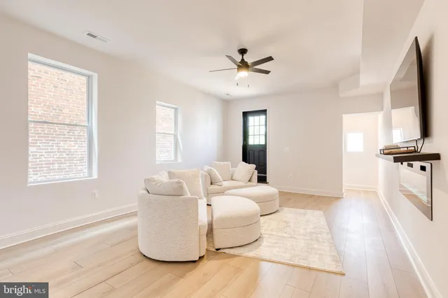 a view of entryway with wooden floor