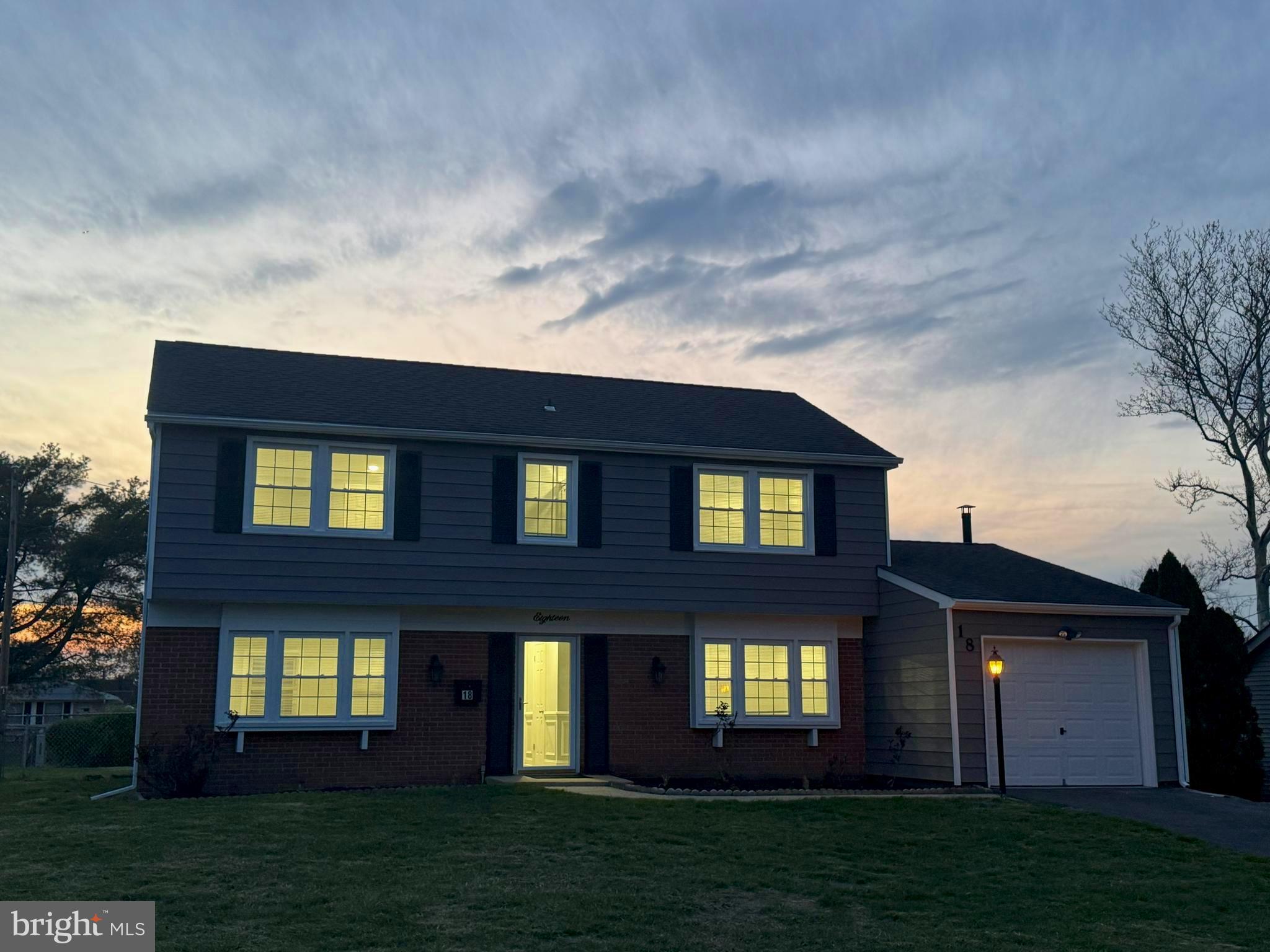 18 Grayson Circle Willingboro, NJ 08046 - Photo 2 of 57 a house view with a garden space