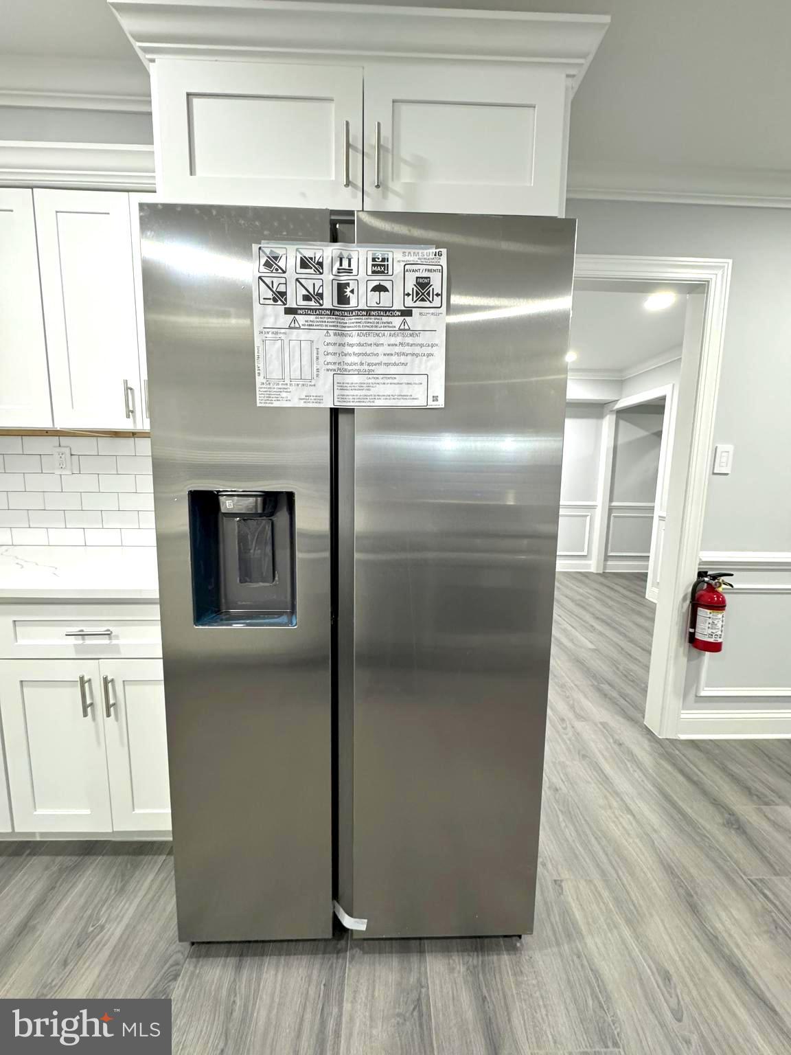 18 Grayson Circle Willingboro, NJ 08046 - Photo 28 of 57 a kitchen with stainless steel appliances granite countertop a refrigerator and a stove