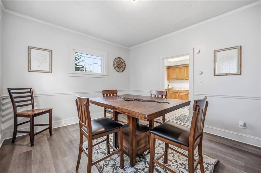 368 Stambaugh Avenue Sharon, PA 16146 - Photo 13 of 43 a view of a dining room with furniture and wooden floor