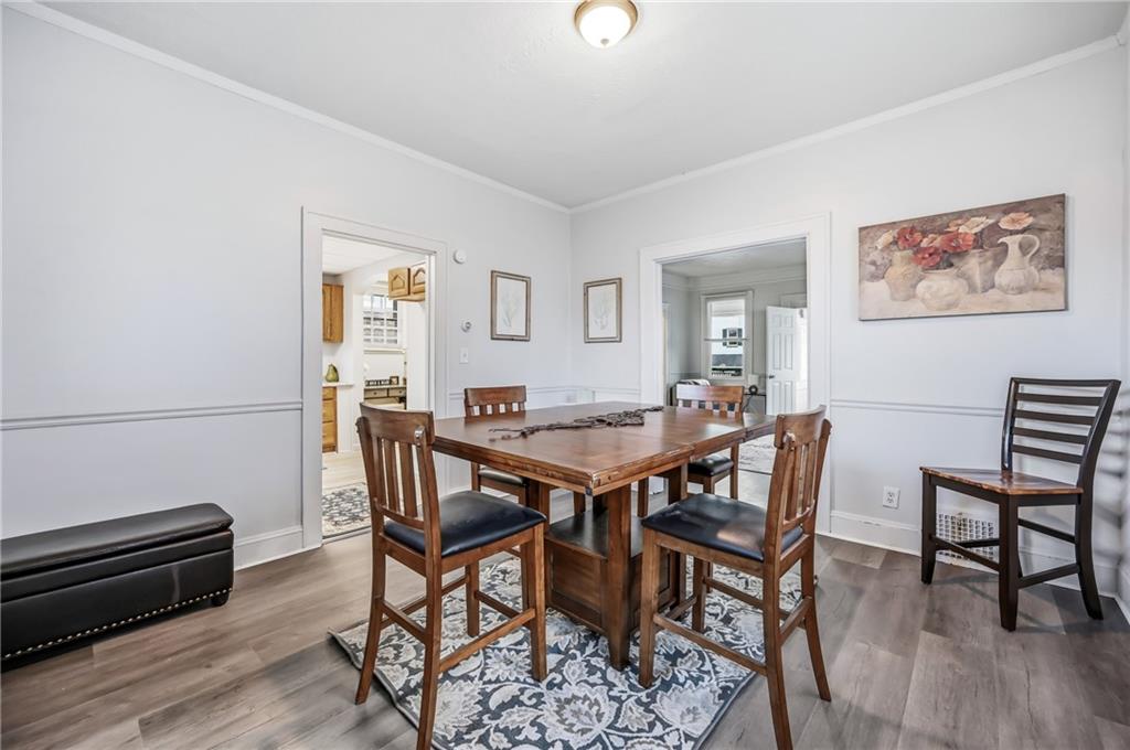 368 Stambaugh Avenue Sharon, PA 16146 - Photo 14 of 43 a view of a dining room with furniture and wooden floor