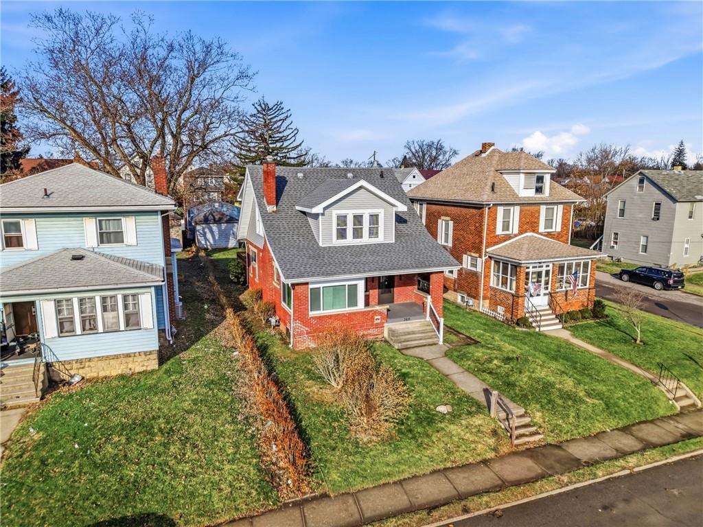 368 Stambaugh Avenue Sharon, PA 16146 - Photo 2 of 43 front view of a house with a yard