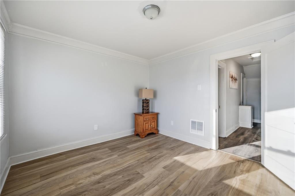 368 Stambaugh Avenue Sharon, PA 16146 - Photo 22 of 43 a room that has a bed and dresser