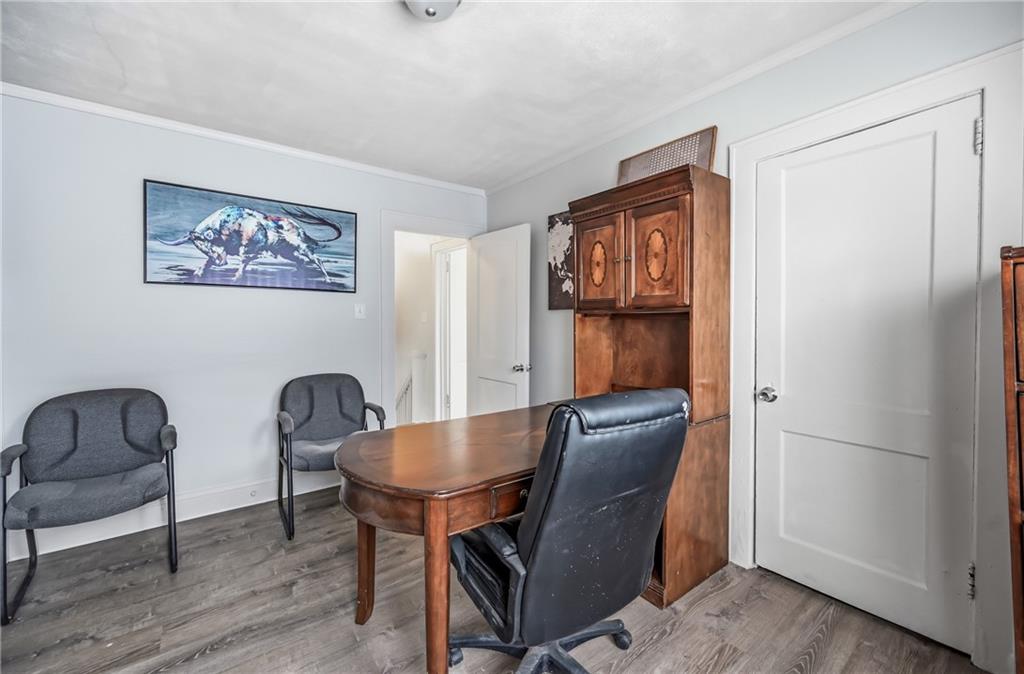 368 Stambaugh Avenue Sharon, PA 16146 - Photo 23 of 43 a workspace room with furniture and wooden floor
