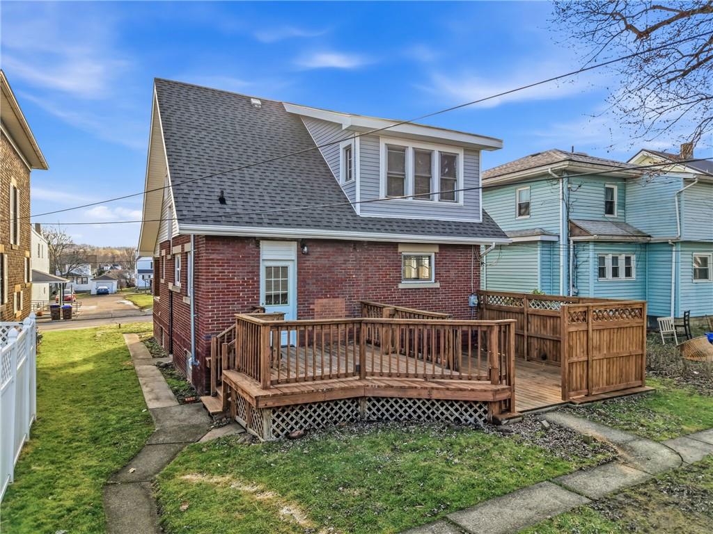 368 Stambaugh Avenue Sharon, PA 16146 - Photo 4 of 43 a view of a house with a yard and deck