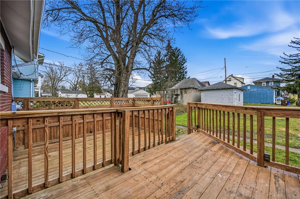 368 Stambaugh Avenue Sharon, PA 16146 - Photo 41 of 43 a view of a deck with wooden floor and fence