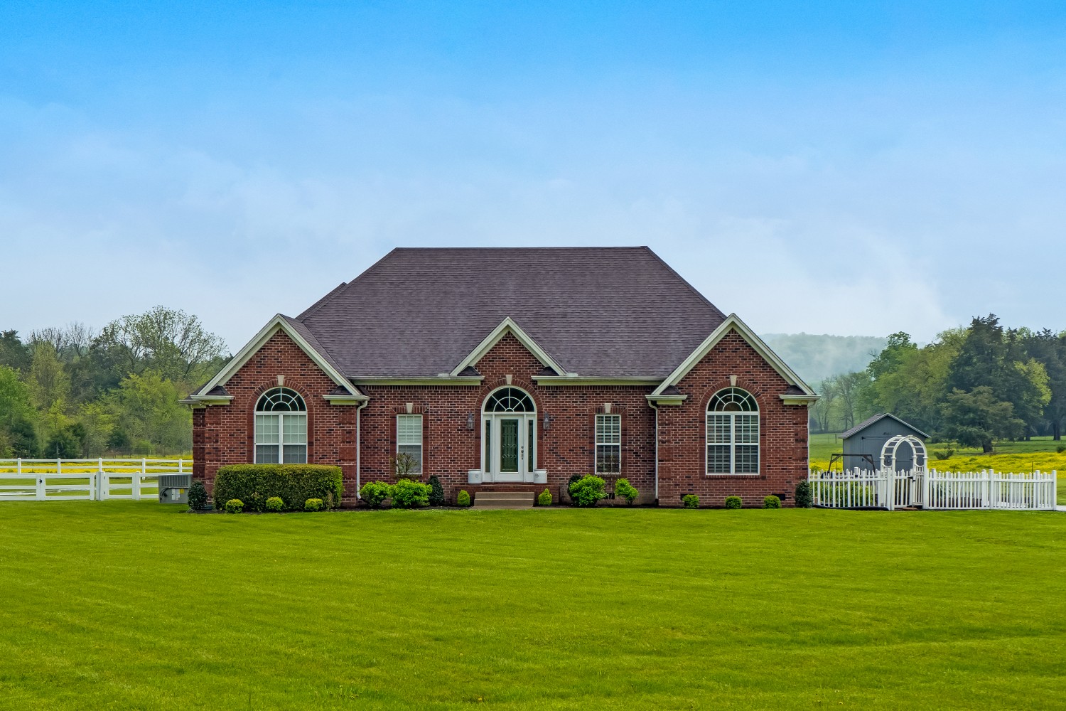 194 Greenvale Road Milton, TN 37118 - Photo 1 of 36 a front view of a house with a garden