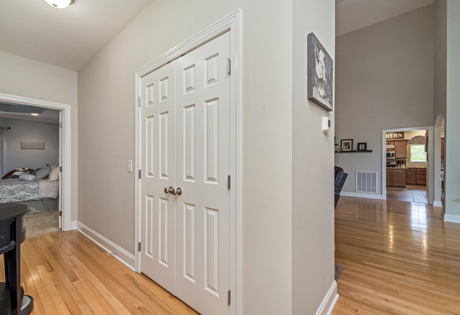 194 Greenvale Road Milton, TN 37118 - Photo 22 of 36 a view of a hallway with wooden floor and a bathroom