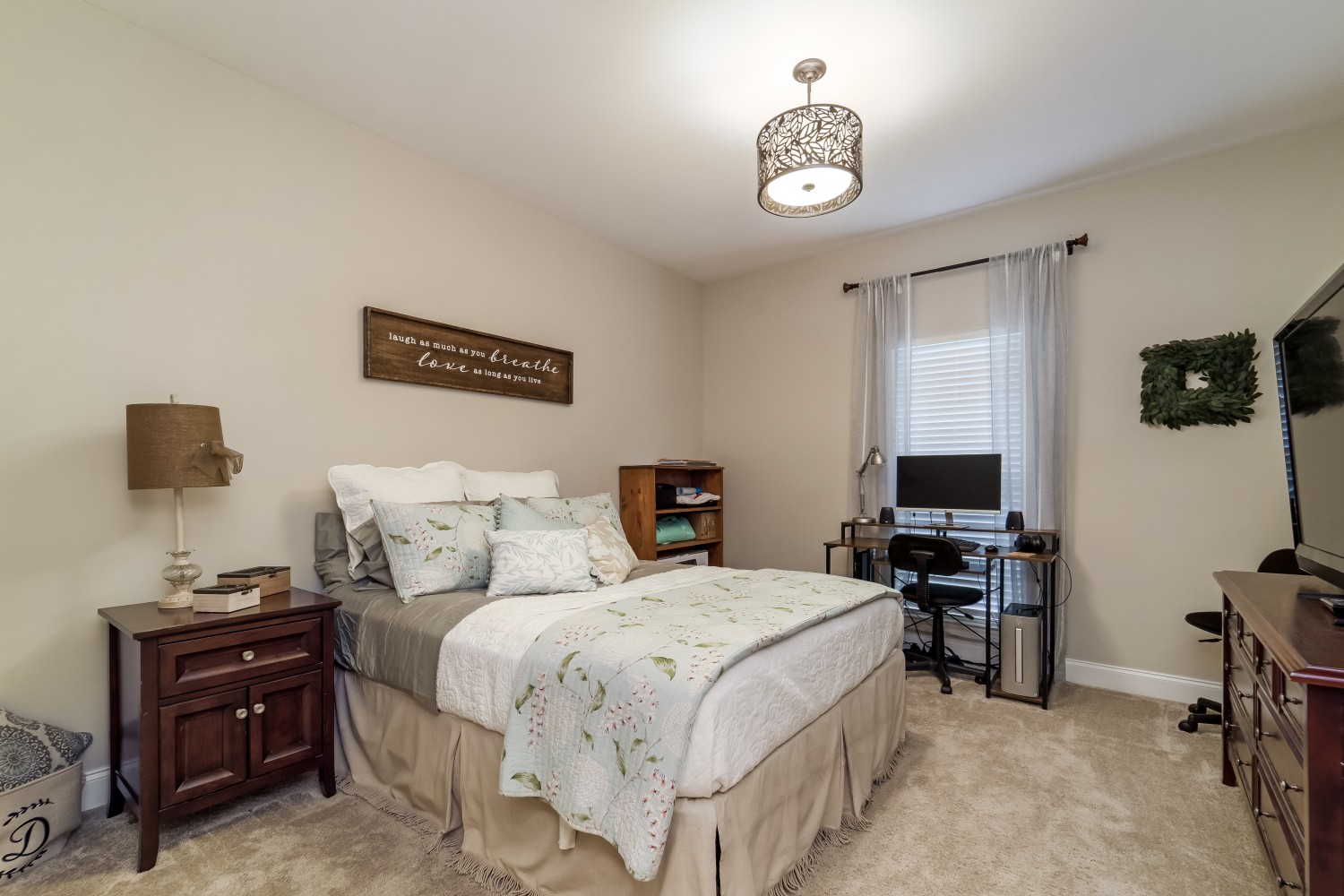 194 Greenvale Road Milton, TN 37118 - Photo 23 of 36 a bedroom with a bed and a flat screen tv