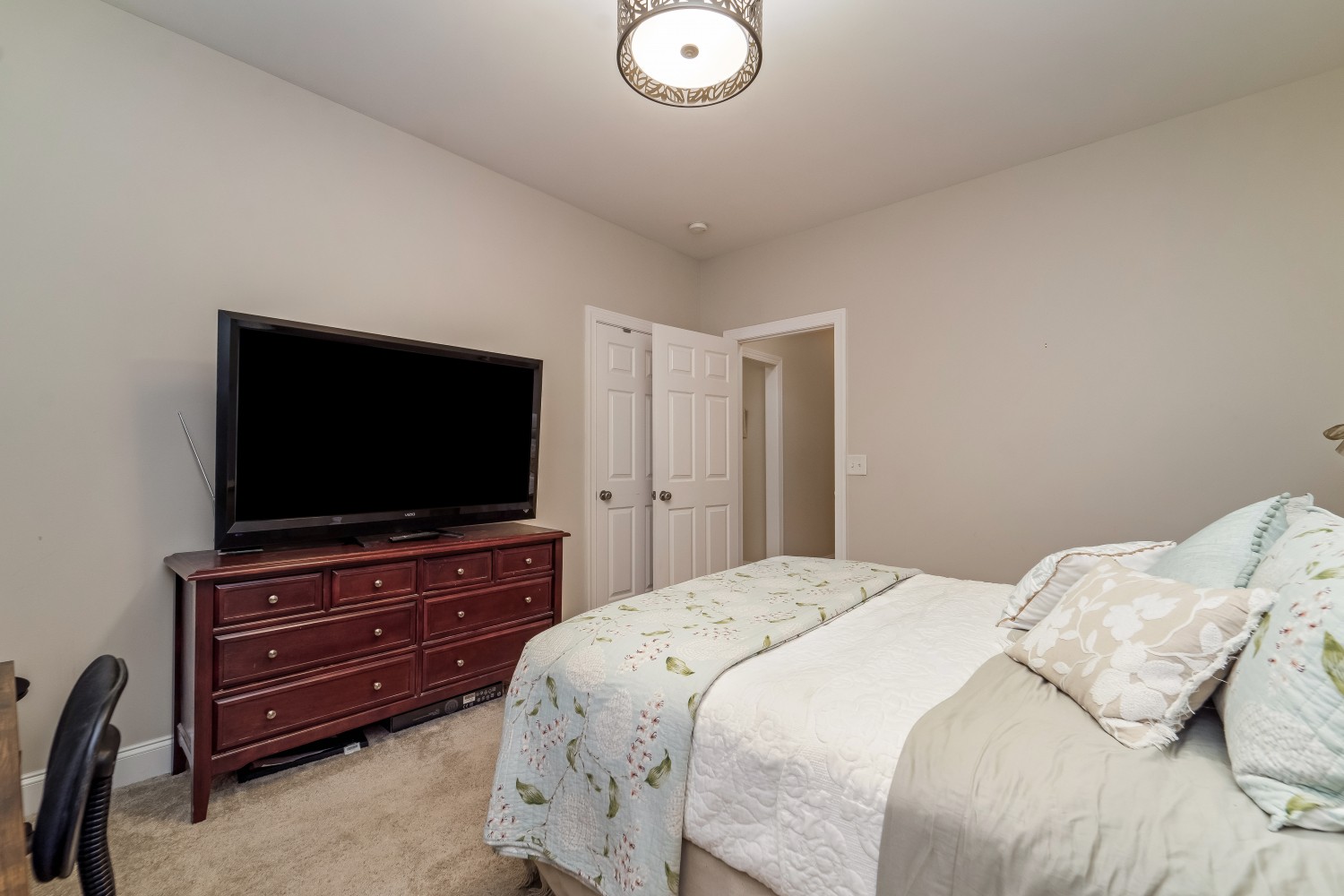 194 Greenvale Road Milton, TN 37118 - Photo 24 of 36 a bedroom with a bed and a flat screen tv