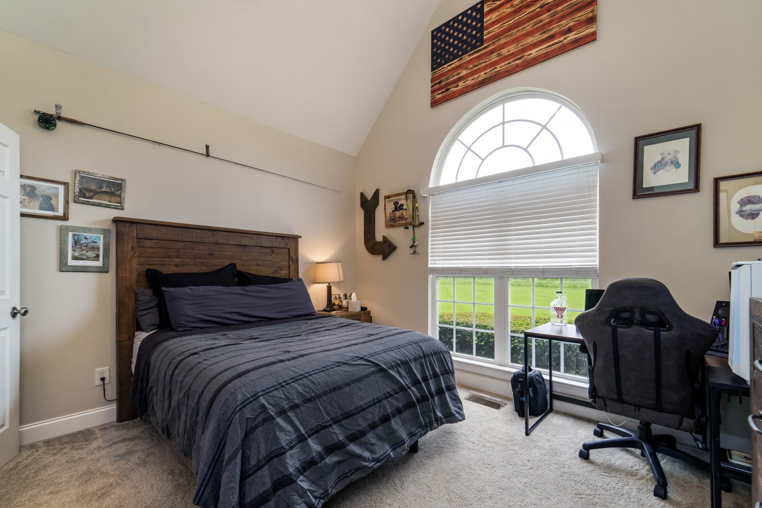 194 Greenvale Road Milton, TN 37118 - Photo 25 of 36 a bedroom with a bed a computer on the desk and a large window