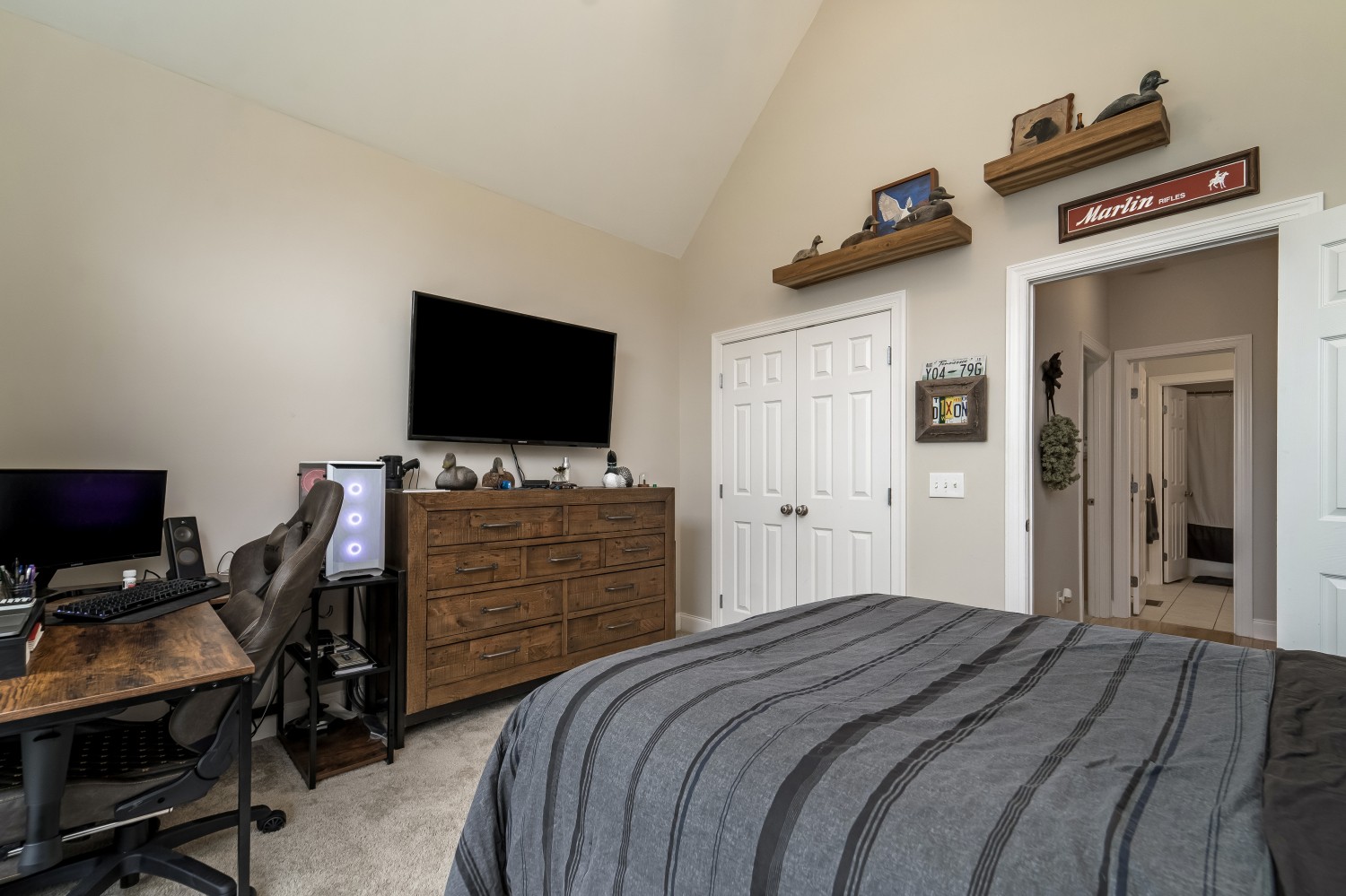 194 Greenvale Road Milton, TN 37118 - Photo 27 of 36 a bedroom with a bed and a flat screen tv