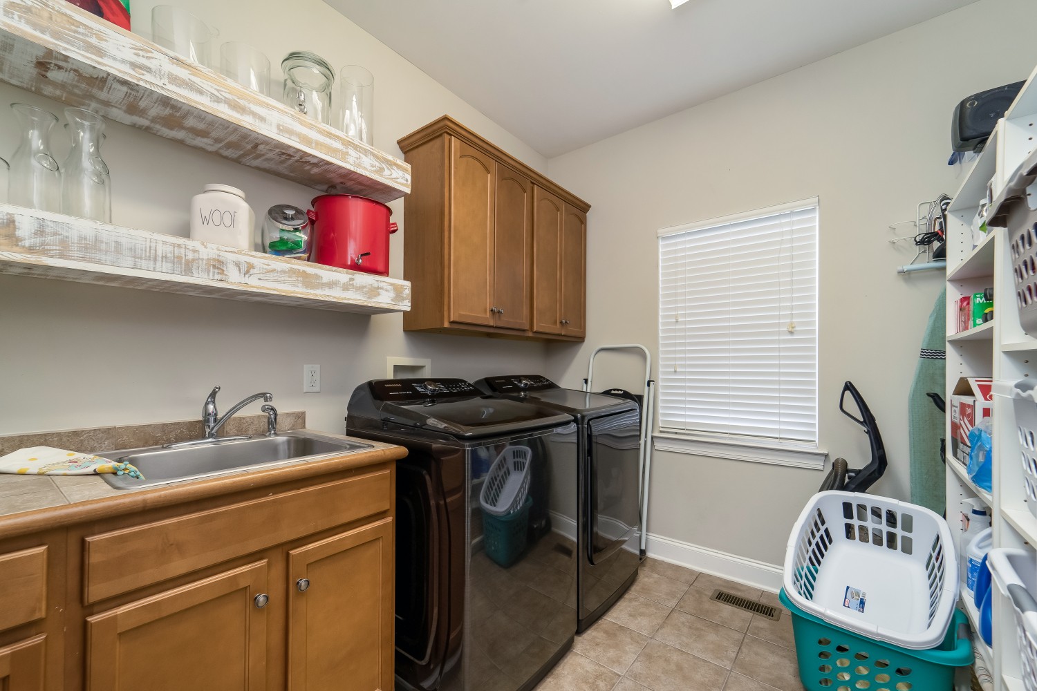 194 Greenvale Road Milton, TN 37118 - Photo 34 of 36 a kitchen with stainless steel appliances granite countertop a sink stove and cabinets