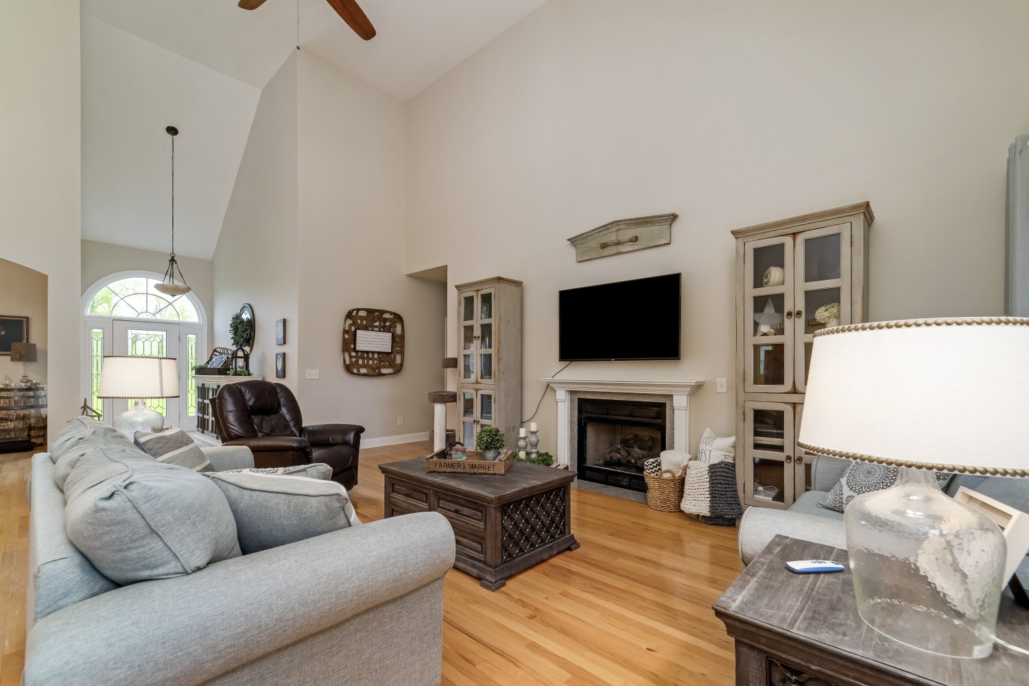 194 Greenvale Road Milton, TN 37118 - Photo 6 of 36 a living room with furniture a flat screen tv and a fireplace