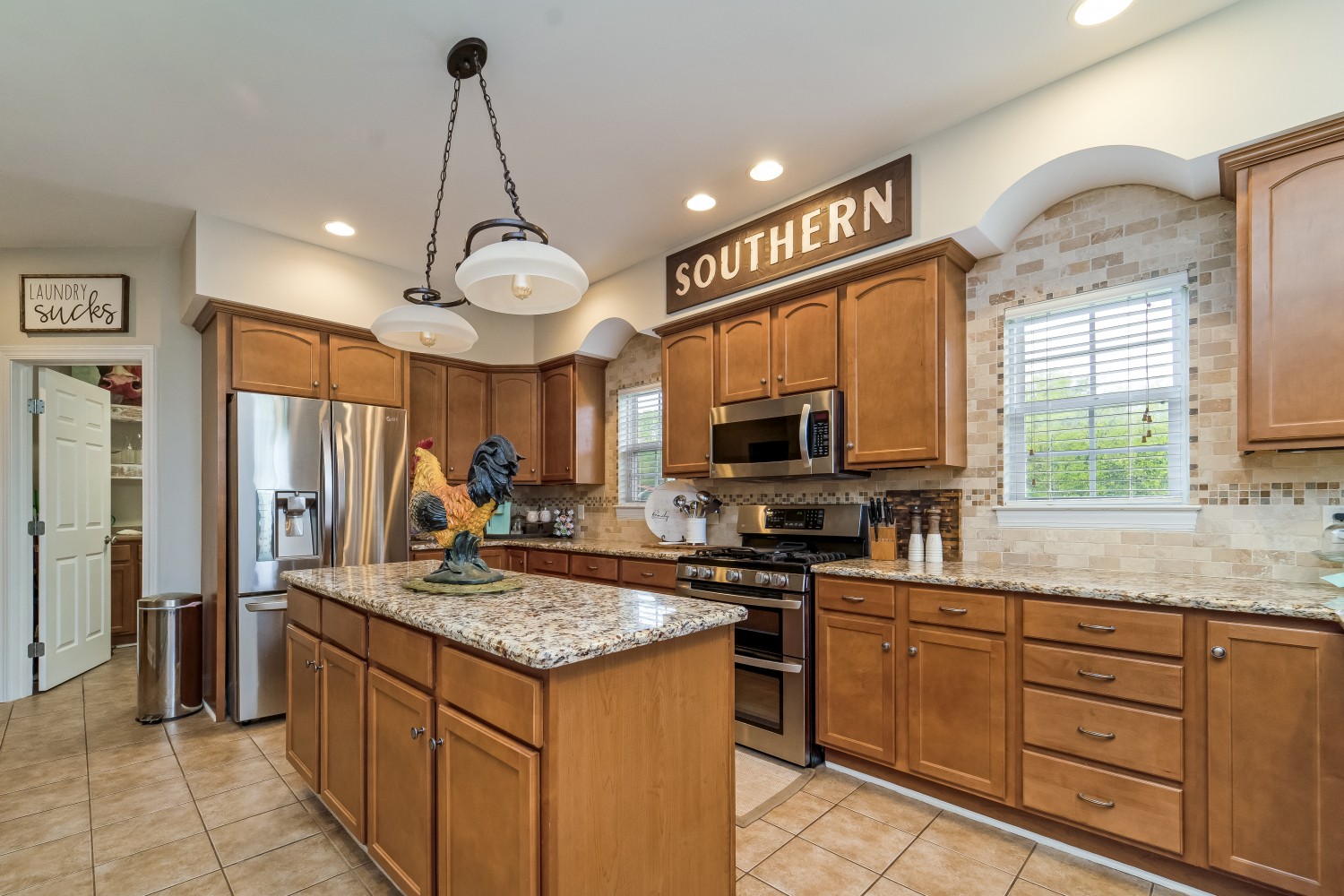 194 Greenvale Road Milton, TN 37118 - Photo 9 of 36 a kitchen with sink stove and refrigerator