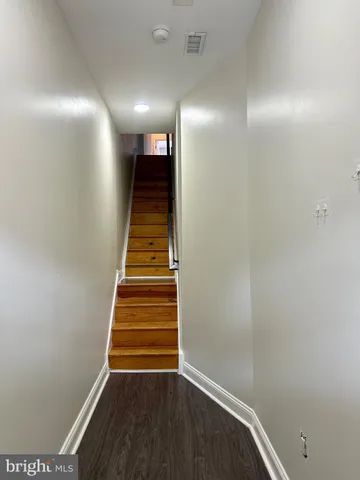 a view of entryway with stairs