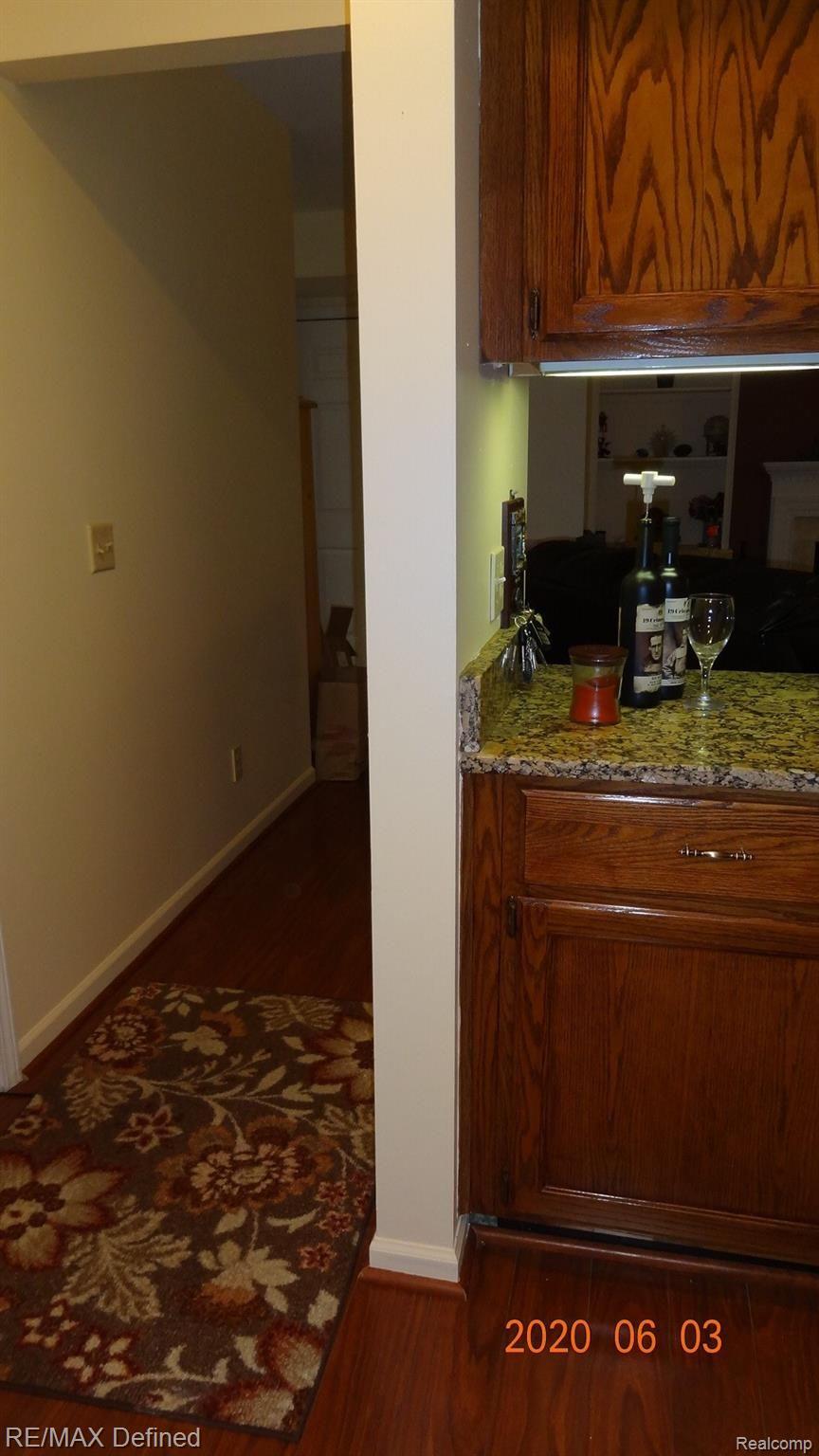 1675 Huntington Park, Unit E Rochester, MI 48309 - Photo 18 of 33 Hallway from the laundry room