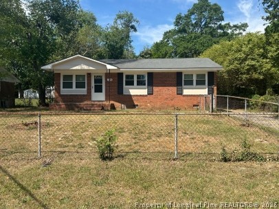 1070 Rulnick Street Fayetteville, NC 28304 - Photo 1 of 15 a house view with a outdoor space