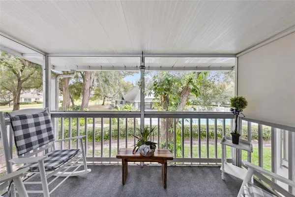 a living room with furniture and a area