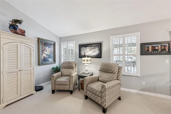 a kitchen with cabinets and stainless steel appliances