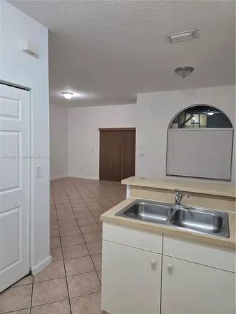 a sink and a shower in a room