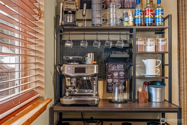 a kitchen with a stove and cabinets