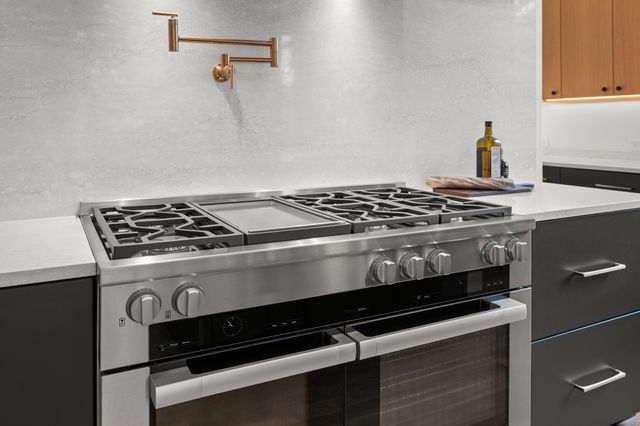 a view of a hallway with a white walls