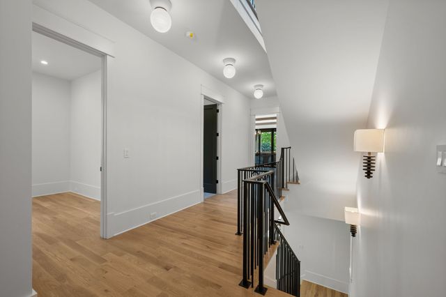 a bathroom with a mirror and a shower