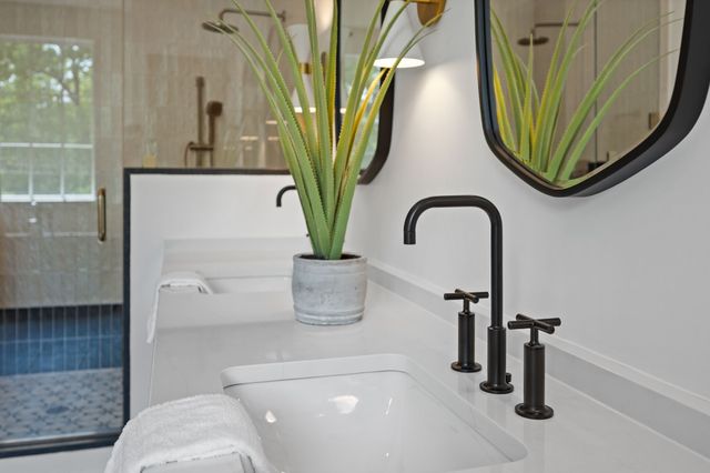 a view of staircase with wooden floor and white walls