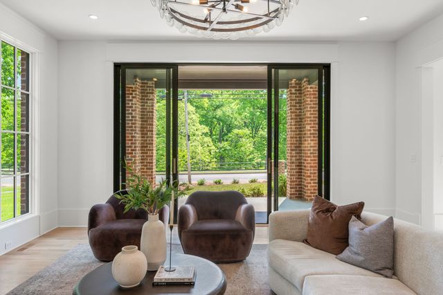 a bathroom with a sink mirror and vanity