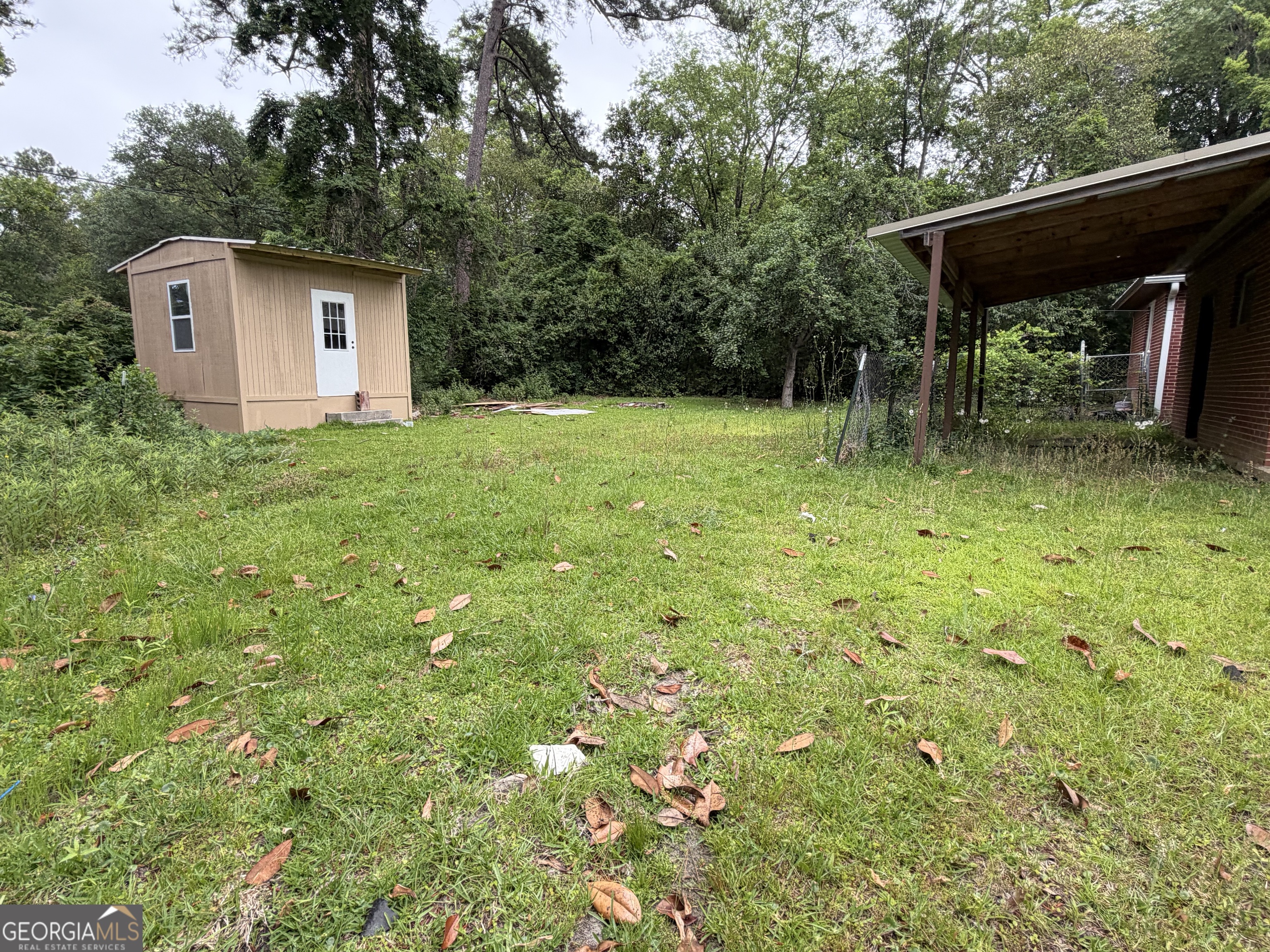 225 West Jessamine Street Fitzgerald, GA 31750 - Photo 33 of 39 a view of a house with backyard