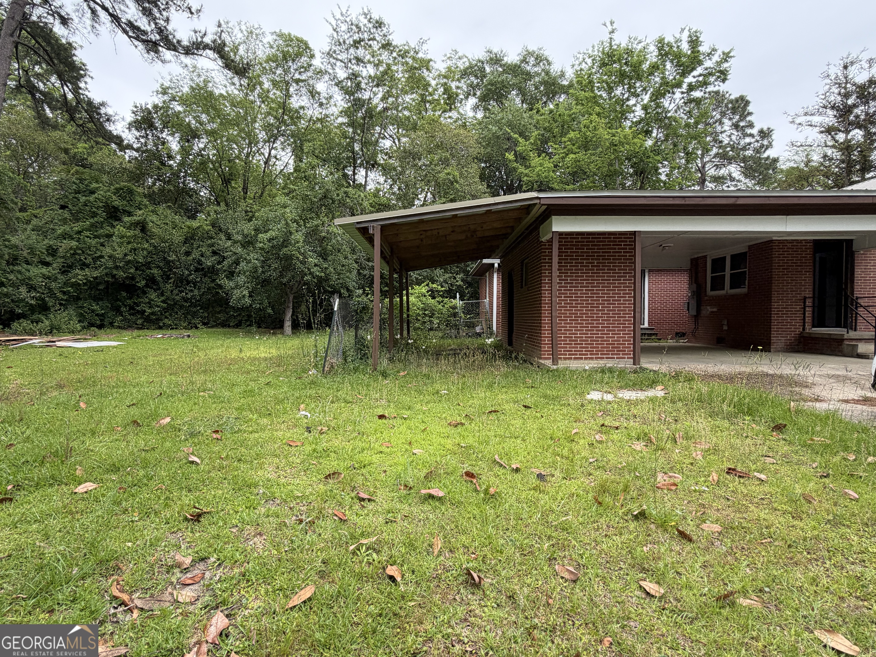 225 West Jessamine Street Fitzgerald, GA 31750 - Photo 35 of 39 a view of a backyard