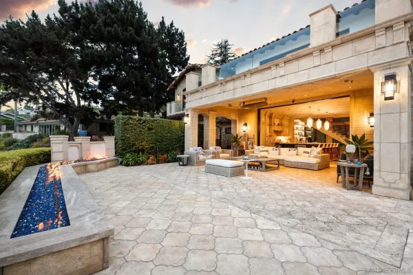 a view of swimming pool from a dining room