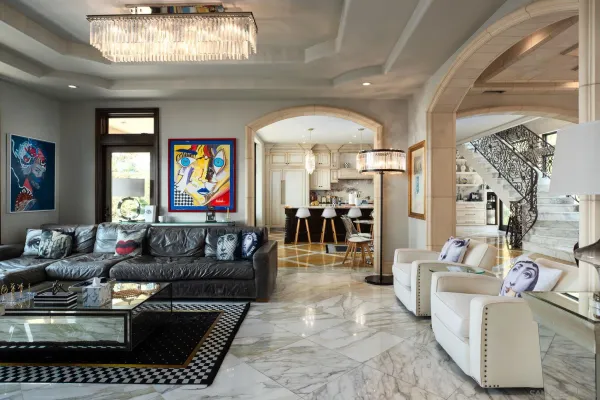 a living room with furniture and a flat screen tv