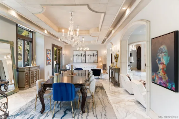 a large bathroom with a sink mirror and shower